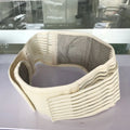 Beige self-heating lumbar support belt with magnetic therapy, shown fastened around a waist.
