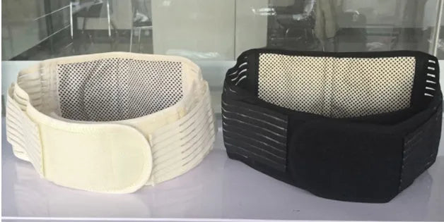 Beige self-heating lumbar support belt with magnetic therapy, shown fastened around a waist.
