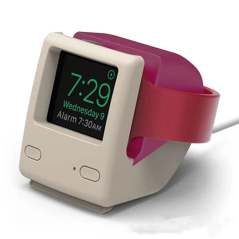 Silicone Apple Watch charging stand in Mint Green, holding a watch in upright position on a desk
