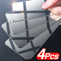Four transparent tempered glass screen protectors for Apple iPhone on a white background