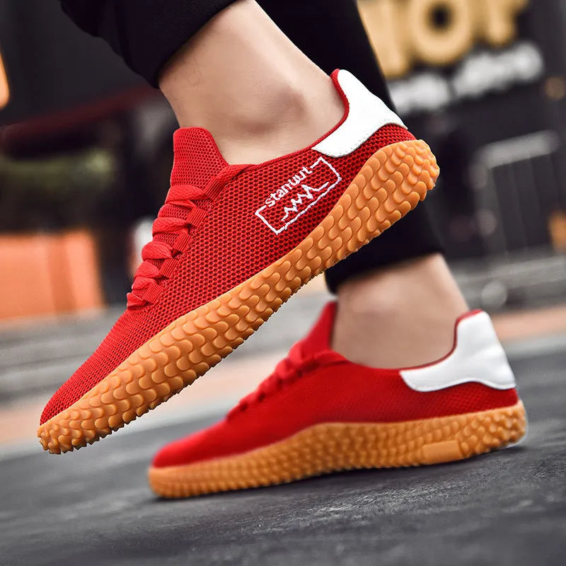 Breathable flying woven casual sneakers for men with fabric upper and rubber sole, available in sizes 36 to 47
