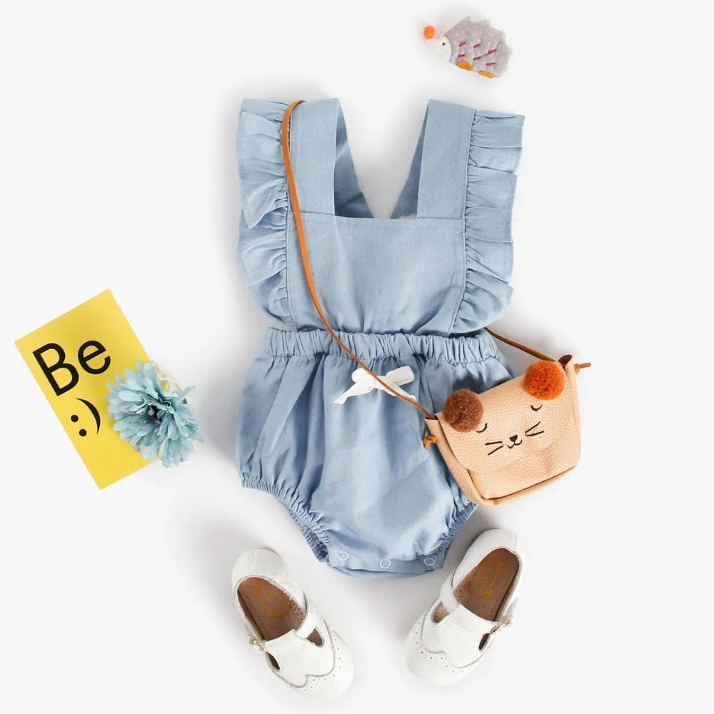 Blue denim lace sleeveless baby romper bodysuit with princess styling on a hanger.