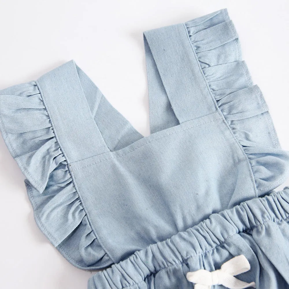 Blue denim lace sleeveless baby romper bodysuit with princess styling on a hanger.