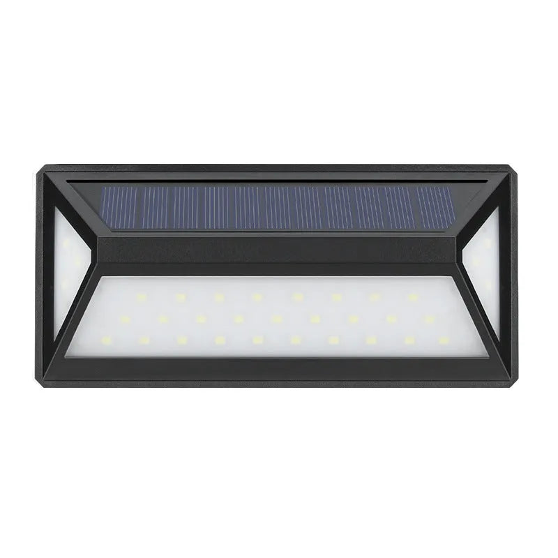 Black solar wall light with 33 LEDs, IP65 rated, measuring 166x75x30mm, mounted on an exterior wall