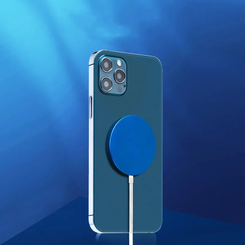 Silver anodised aluminium Magsafe-compatible wireless charger disc for iPhone