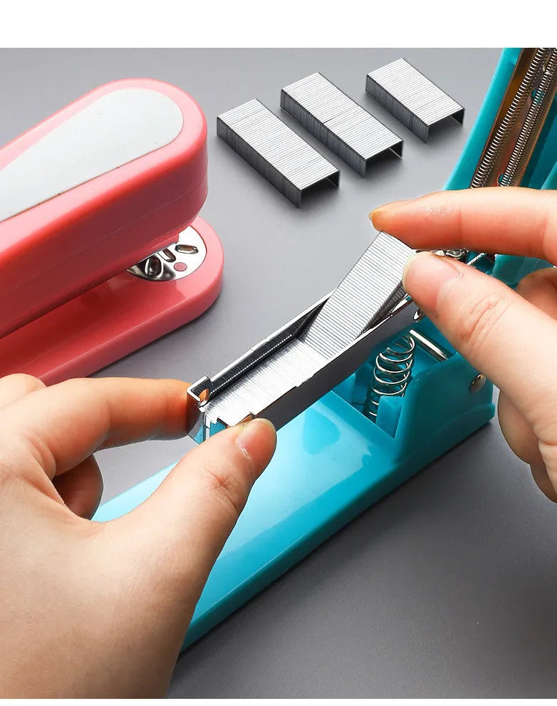 360-degree rotatable desktop stapler in blue showing eight binding direction indicators.