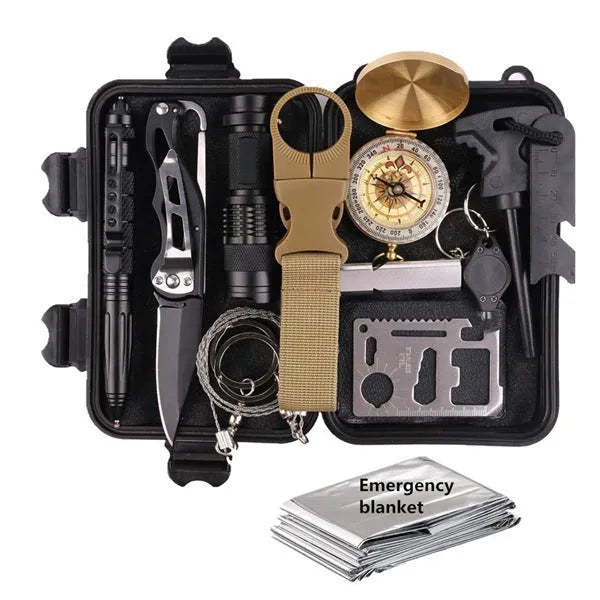 13-piece black stainless steel survival treasure box with tools including flashlight, compass, wire saw, and survival blanket
