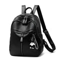 Black soft pu leather backpack with double straps, shown open to display internal organisation.