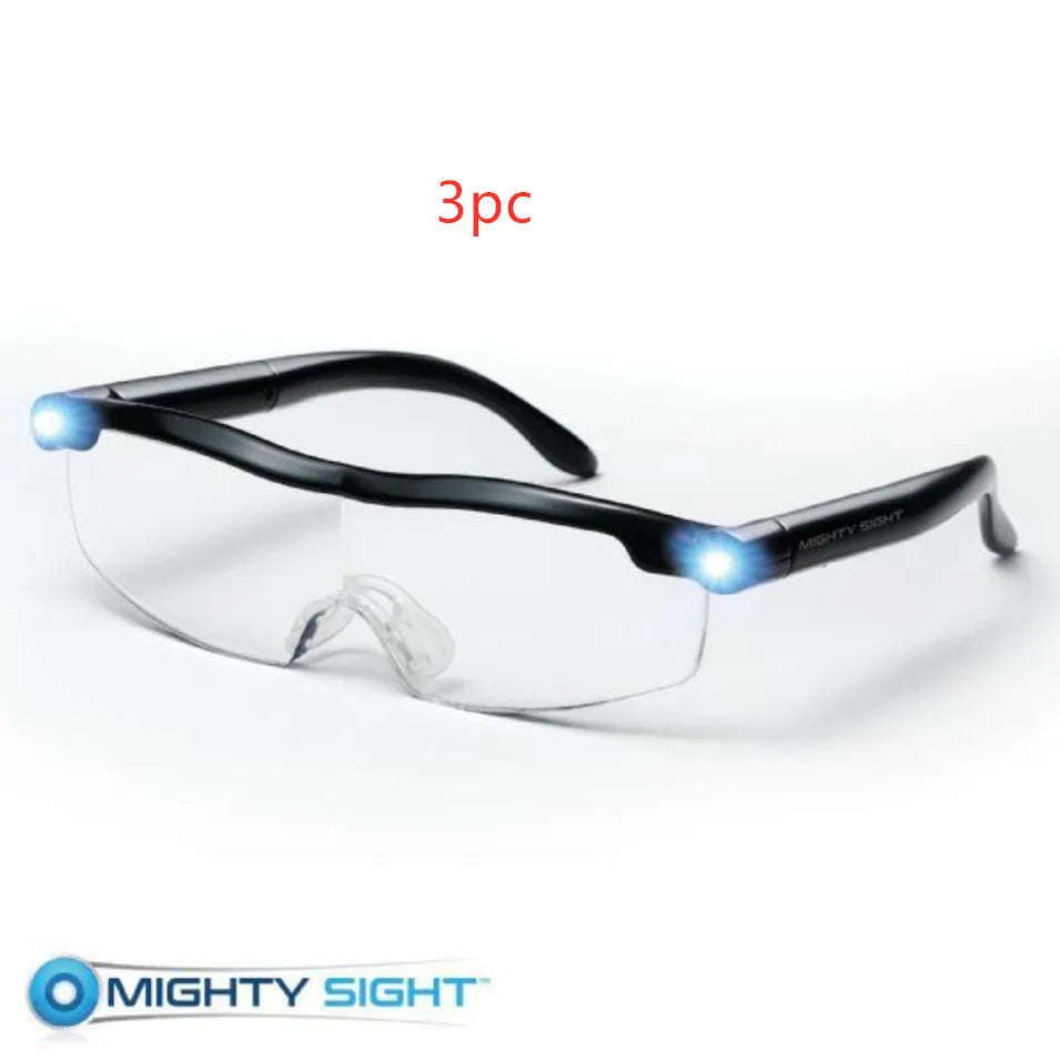 Transparent black USB LED reading glasses with integrated lights on the frame.