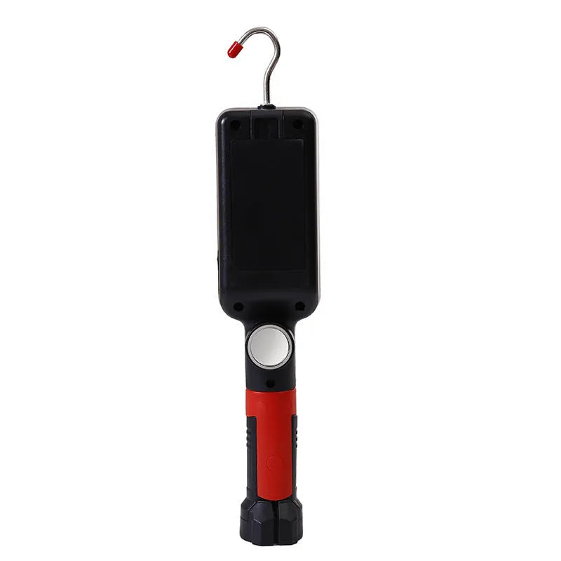 Black portable COB LED flashlight with a magnetic strip on the base and a USB charging port.