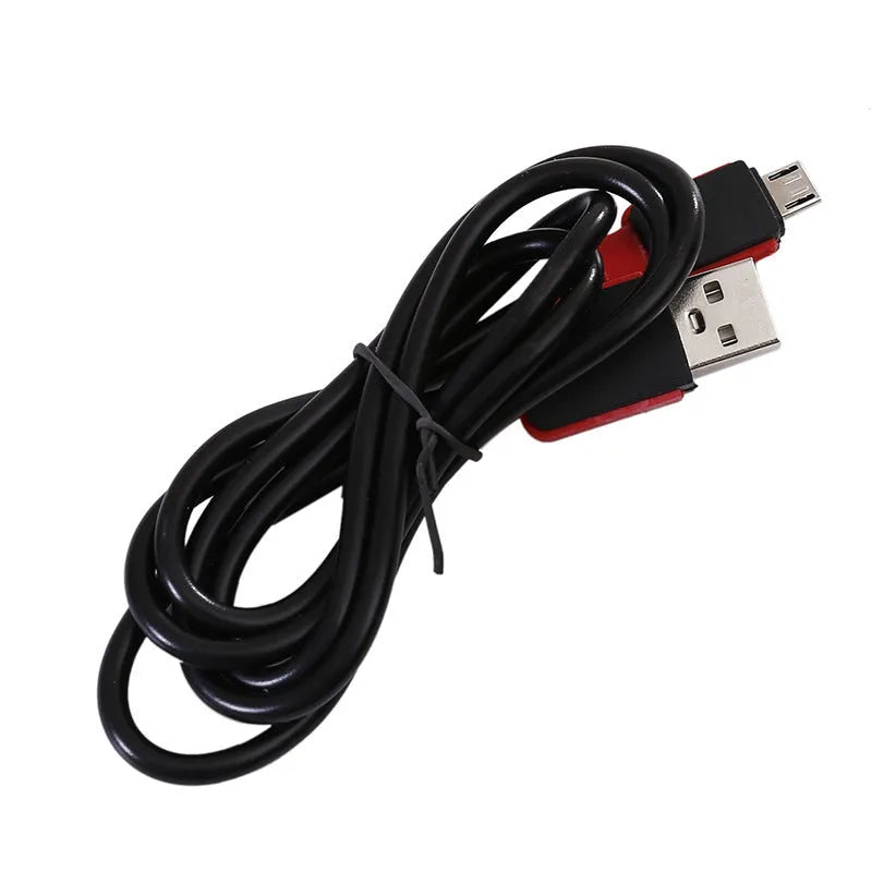 Black portable COB LED flashlight with a magnetic strip on the base and a USB charging port.