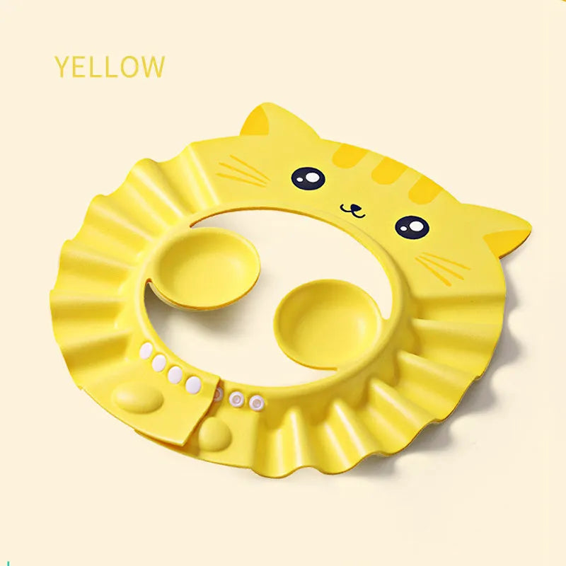 Adjustable baby shampoo cap with cartoon design and extended ear protectors in blue, green, pink, and yellow colours.