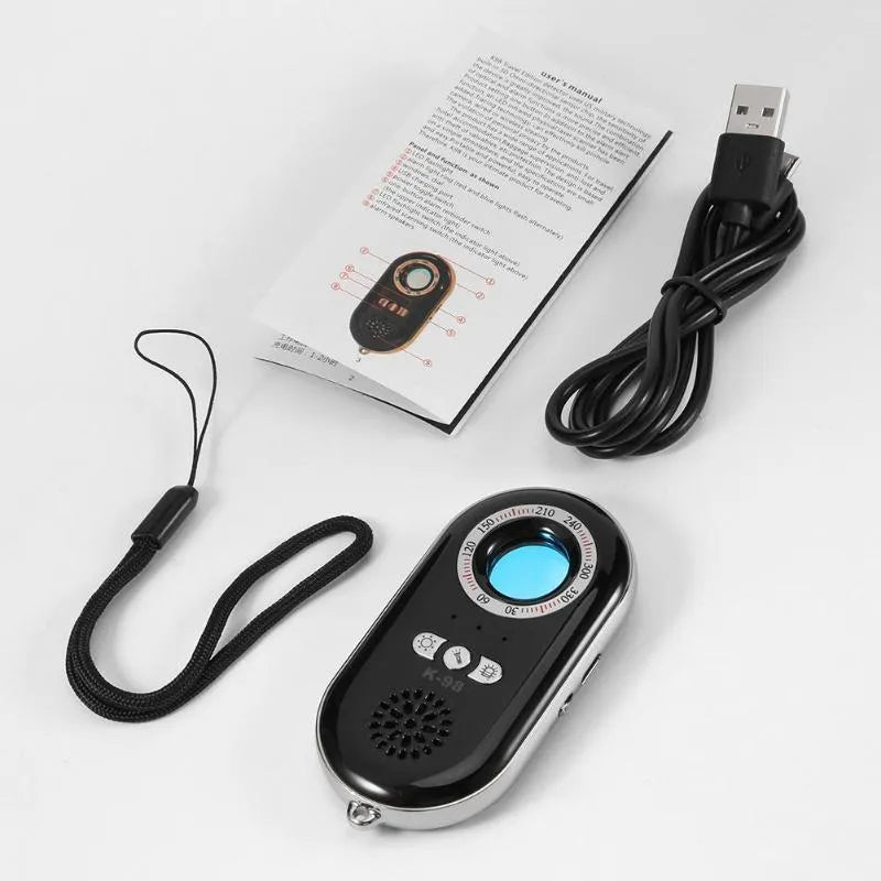 Slim black portable wireless signal detector with anti-theft alarm on a white background.