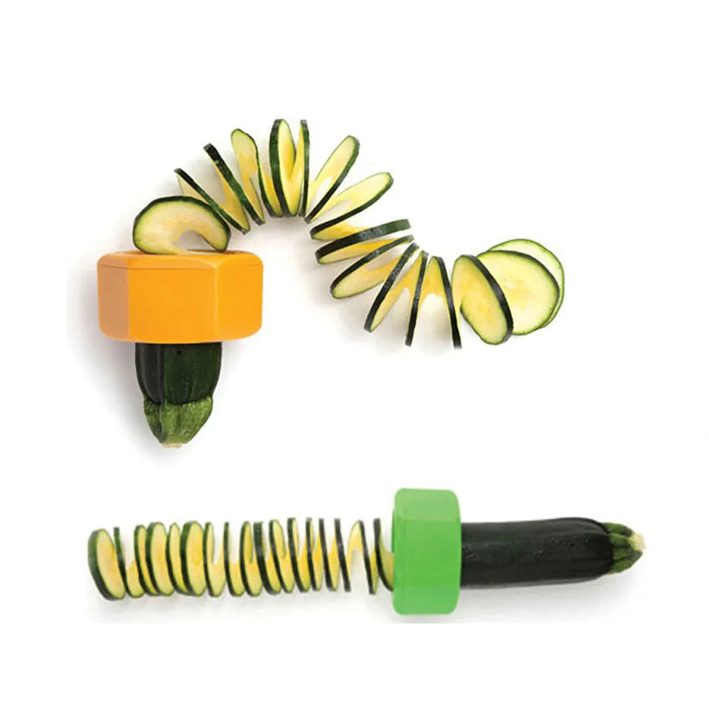 Yellow and green manual spiral vegetable cutter kitchen tool on a kitchen counter