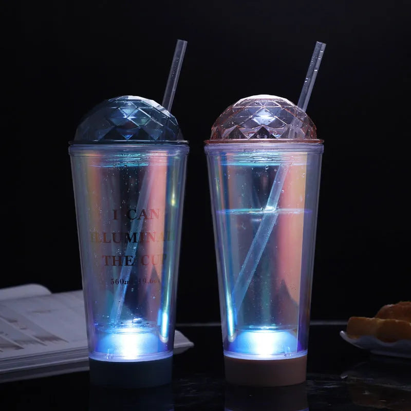 Luminous creative plastic cup with light gradient colour change in blue with double straw and lid