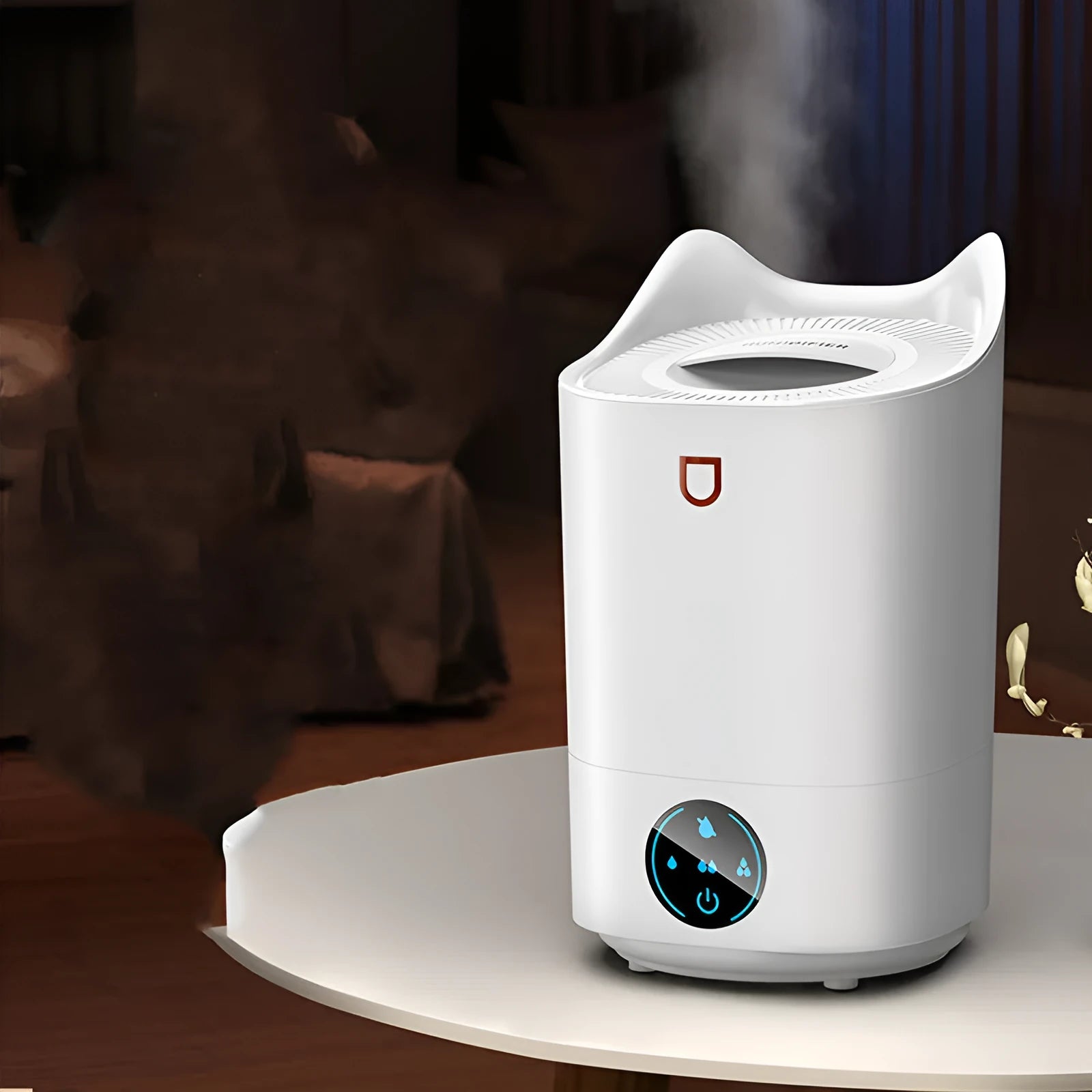 Coral Pink double spray humidifier with three mist outlets and USB cable on a wooden table.
