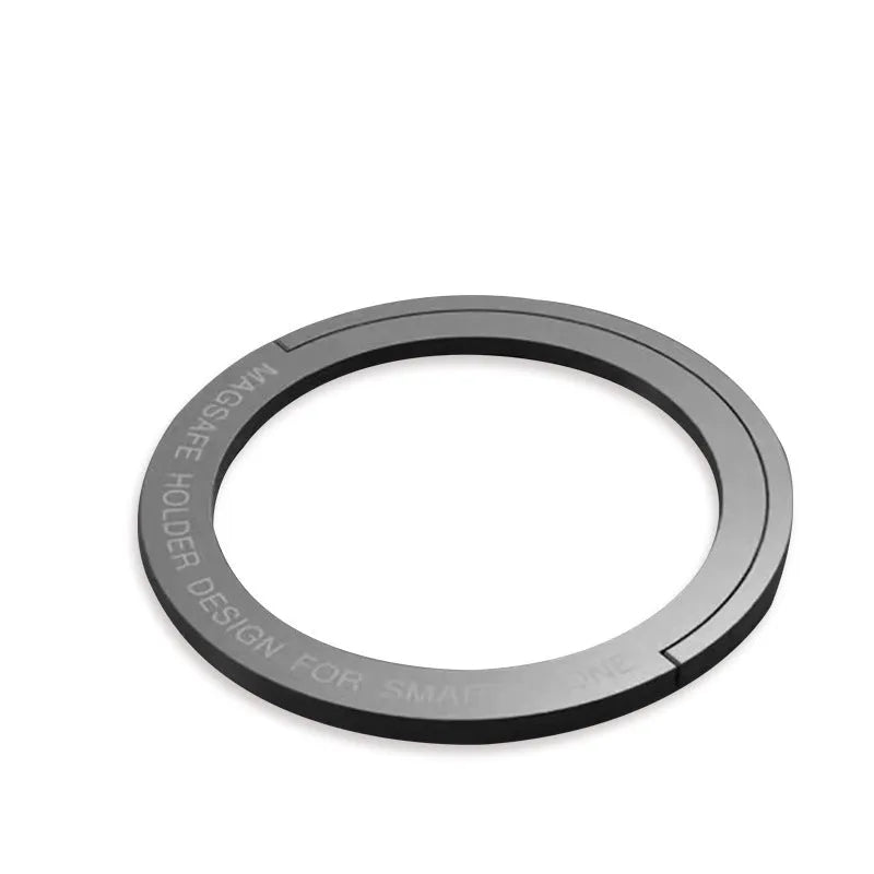 Round zinc alloy mobile phone holder on a desk, 56mm diameter, available in black or silver