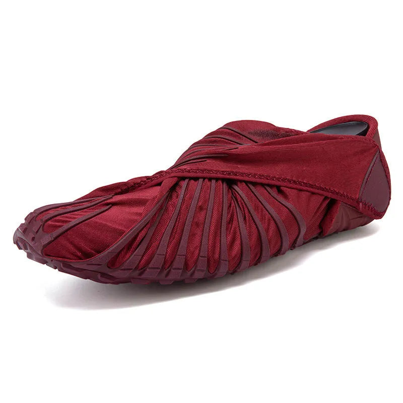 Unisex dance fitness shoes with elastic waterproof upper, red colour, on studio floor