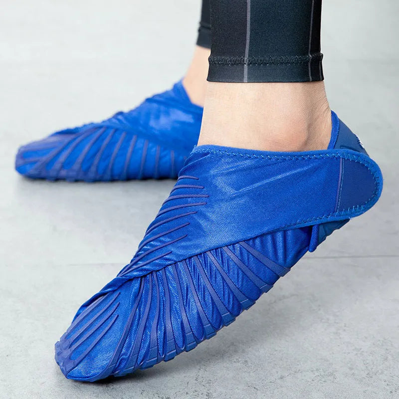 Unisex dance fitness shoes with elastic waterproof upper, red colour, on studio floor