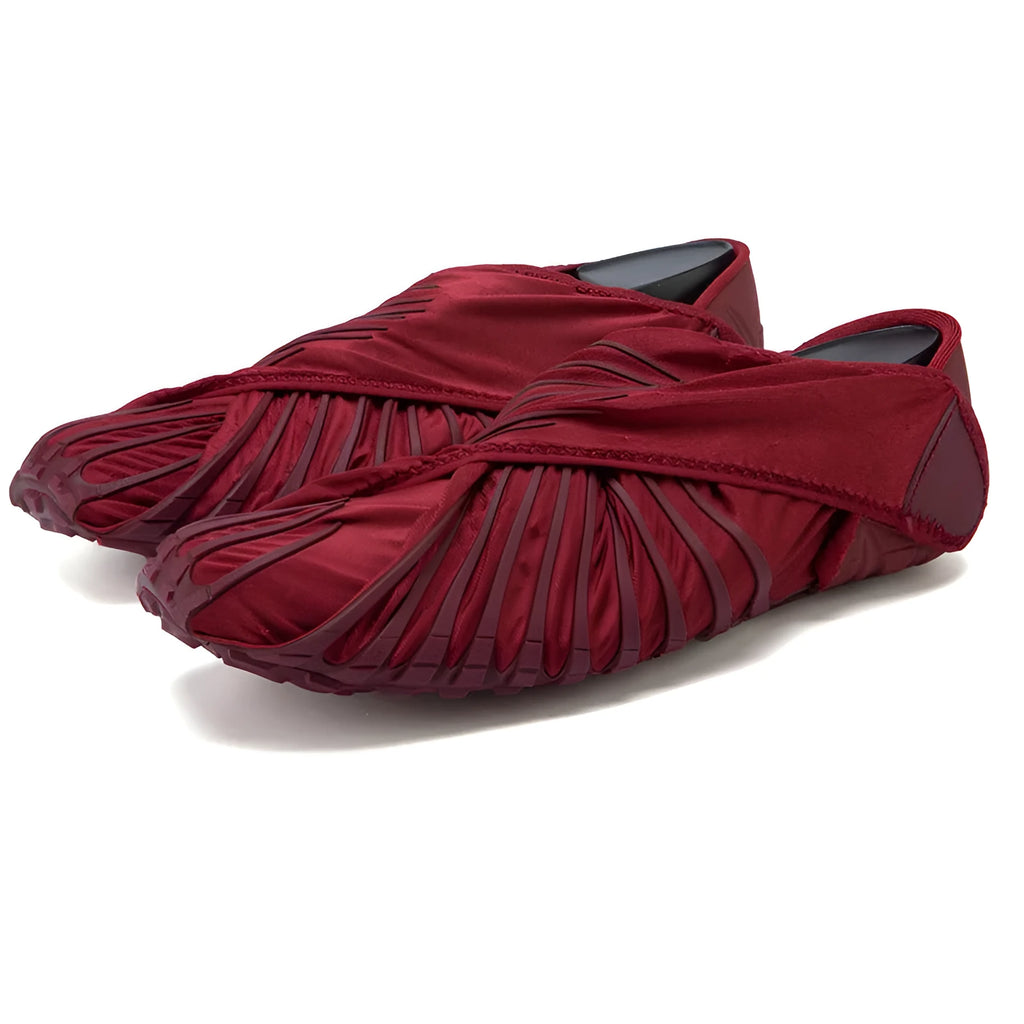 Unisex dance fitness shoes with elastic waterproof upper, red colour, on studio floor