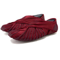 Unisex dance fitness shoes with elastic waterproof upper, red colour, on studio floor