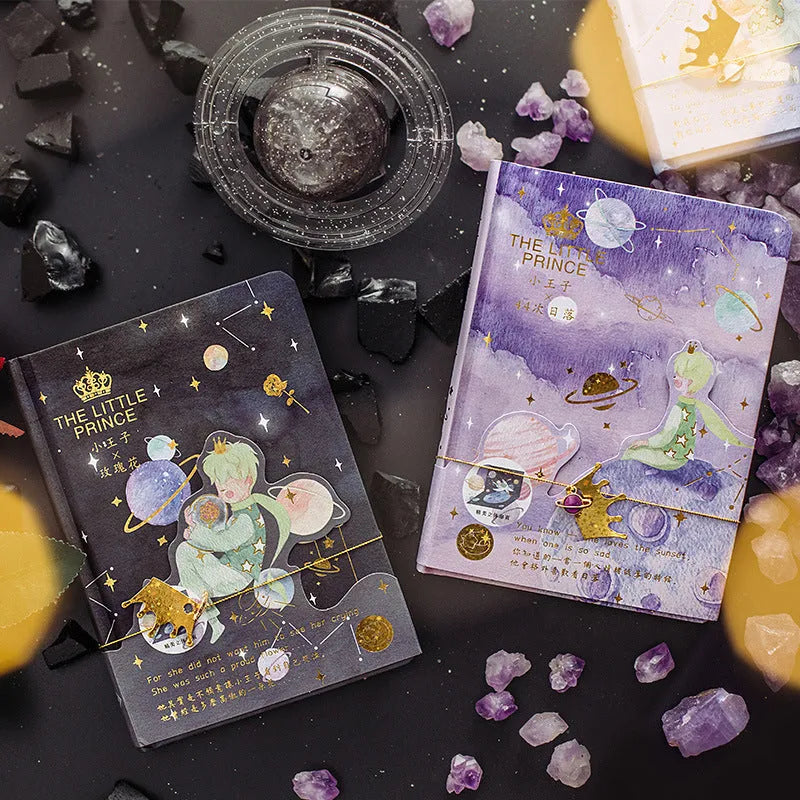 Hardback art notebook with The Little Prince cartoon cover designs showing sunset, bird, rose, and fox illustrations