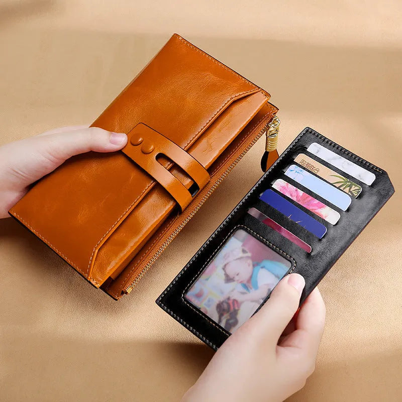 Retro-style women's leather wallet in horizontal square shape with buckle closure and multiple card slots