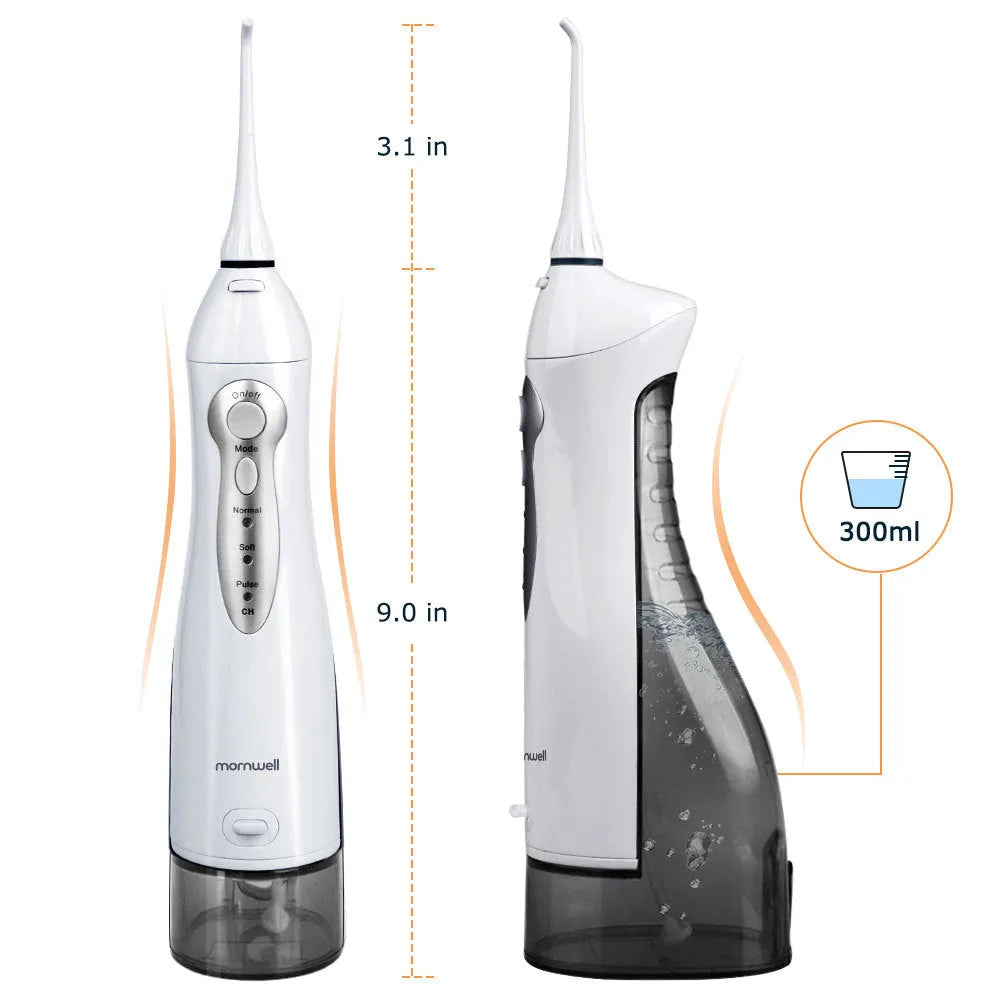 Portable white oral irrigator with large water tank, four nozzles, and a USB charging cable.