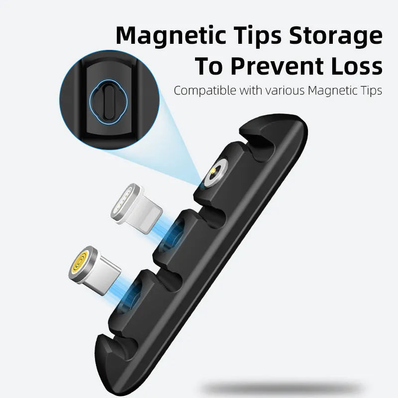 Black soft plastic desktop magnetic data cable organiser on a desk.