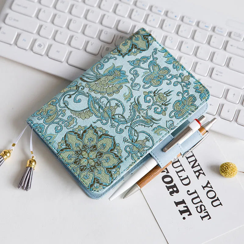 Flying Blue Flowers fabric notebook in A5 or A6 size with 100gsm paper, showing cover pattern.