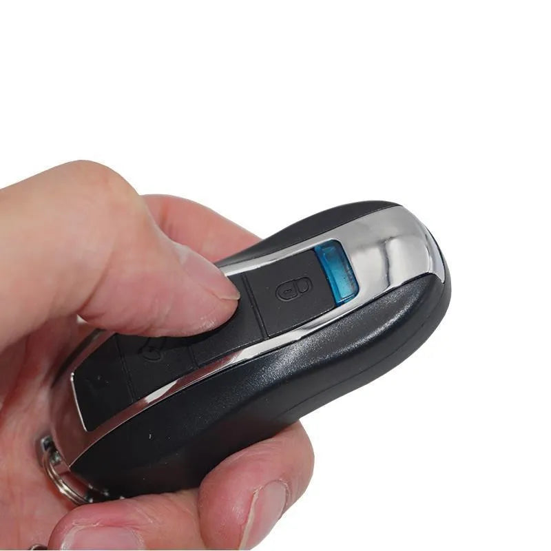Black vibration anti-theft alarm host unit and remote control with IPX4 waterproof rating