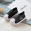 Children's striped casual sneakers with a non-slip PVC sole in yellow, shown on a size chart.