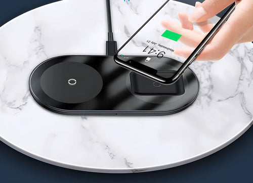 Baseus black wireless charging pad with phone on top and AirPods case in vertical slot