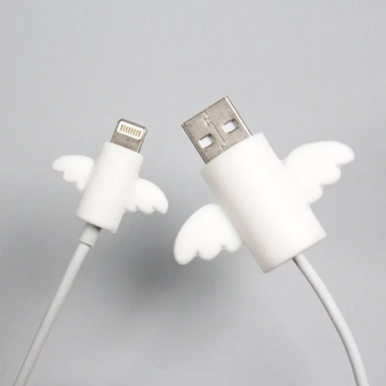 White angel and black bat style silicone protective covers for mobile phone charging cables.