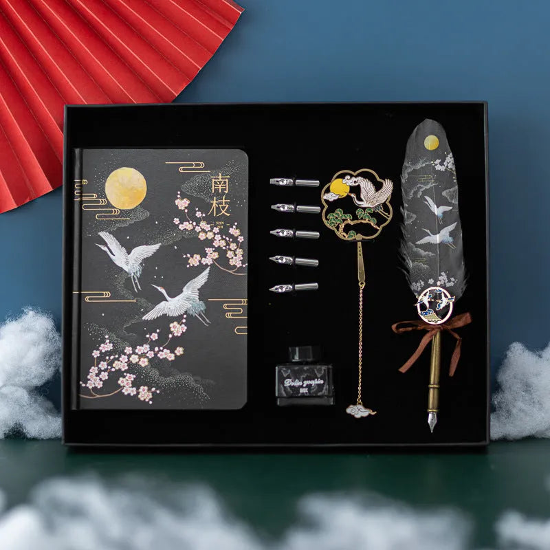 Chinese style feather pen set with metal sheath, four colour feathers, and Jianhegui notebook.