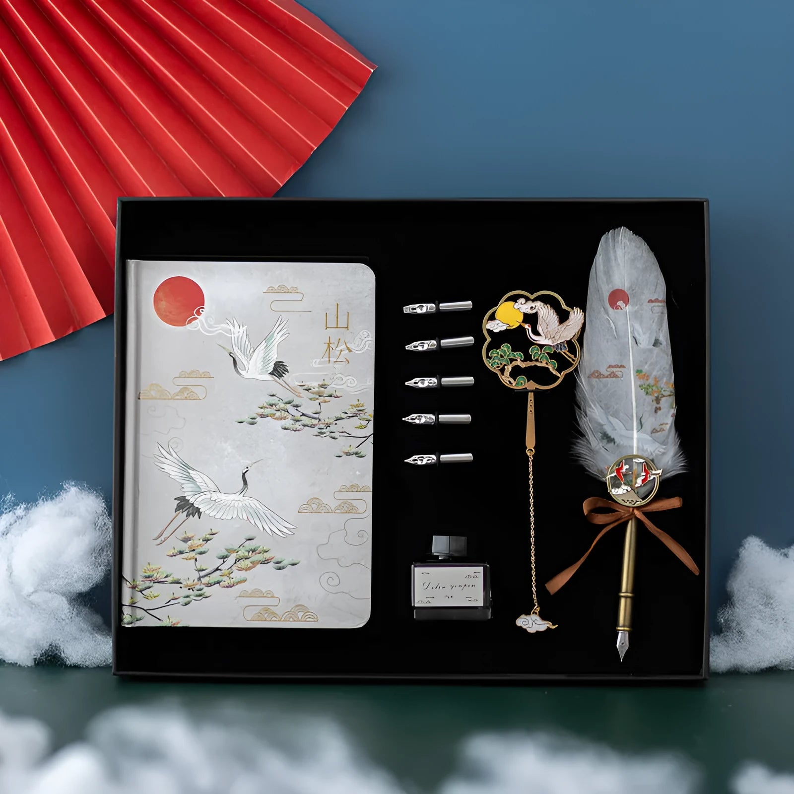 Chinese style feather pen set with metal sheath, four colour feathers, and Jianhegui notebook.