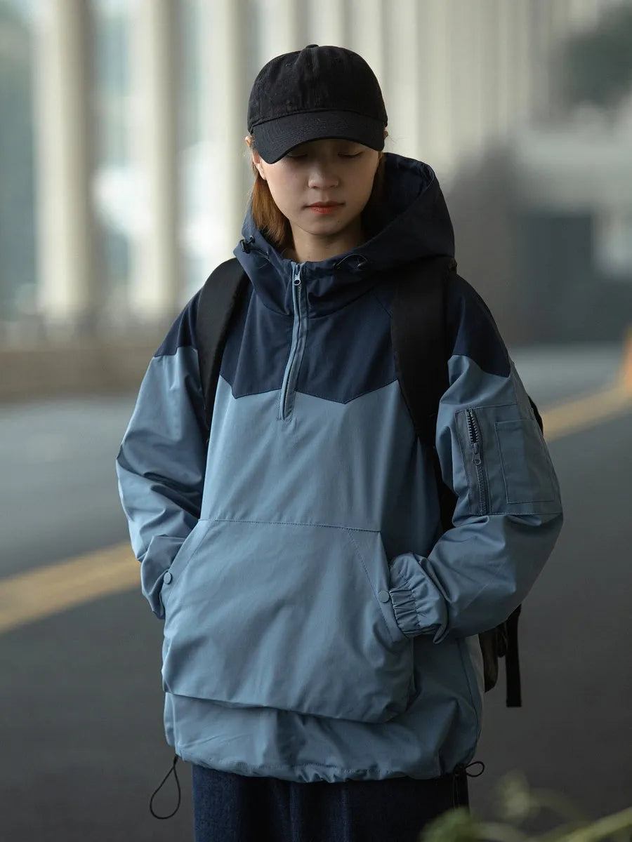 Color matching tooling hooded pullover jacket for men and women in light blue with zipper closure and loose fit