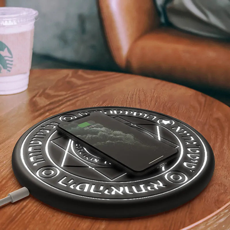 10W fast wireless charger with magic array LED glowing pattern on an ultra-thin black ABS base.