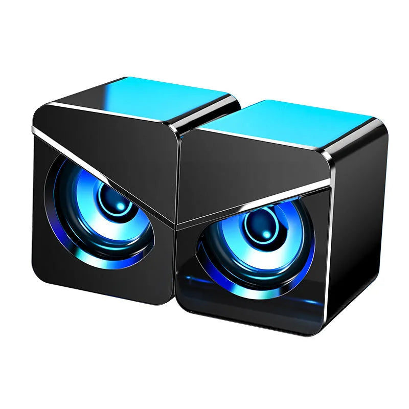 Black and white desktop USB multimedia speakers with 3.5mm audio connection for computers