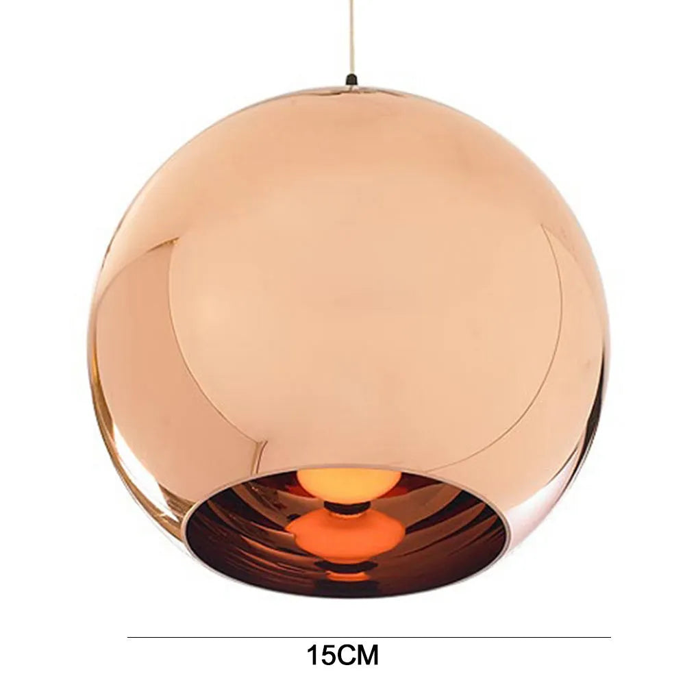 Round clear glass pendant chandelier with electroplated metal frame hanging on a thin wire