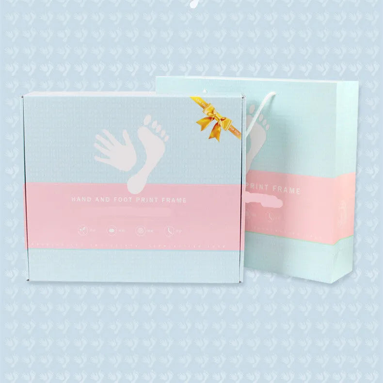 Handcrafted DIY anniversary photo frame for baby hand and foot prints in black, pink, or white with digital post and warm light options.