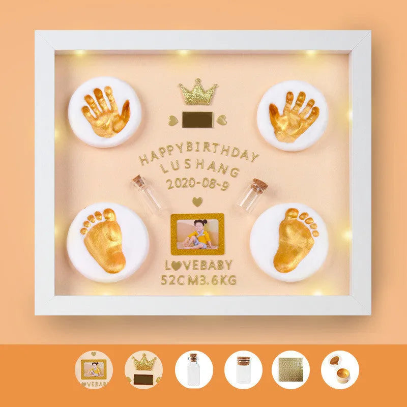 Handcrafted DIY anniversary photo frame for baby hand and foot prints in black, pink, or white with digital post and warm light options.