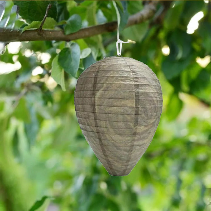 White beehive-shaped paper lantern with hexagonal pattern, measuring 22cm by 28cm.