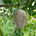 White beehive-shaped paper lantern with hexagonal pattern, measuring 22cm by 28cm.