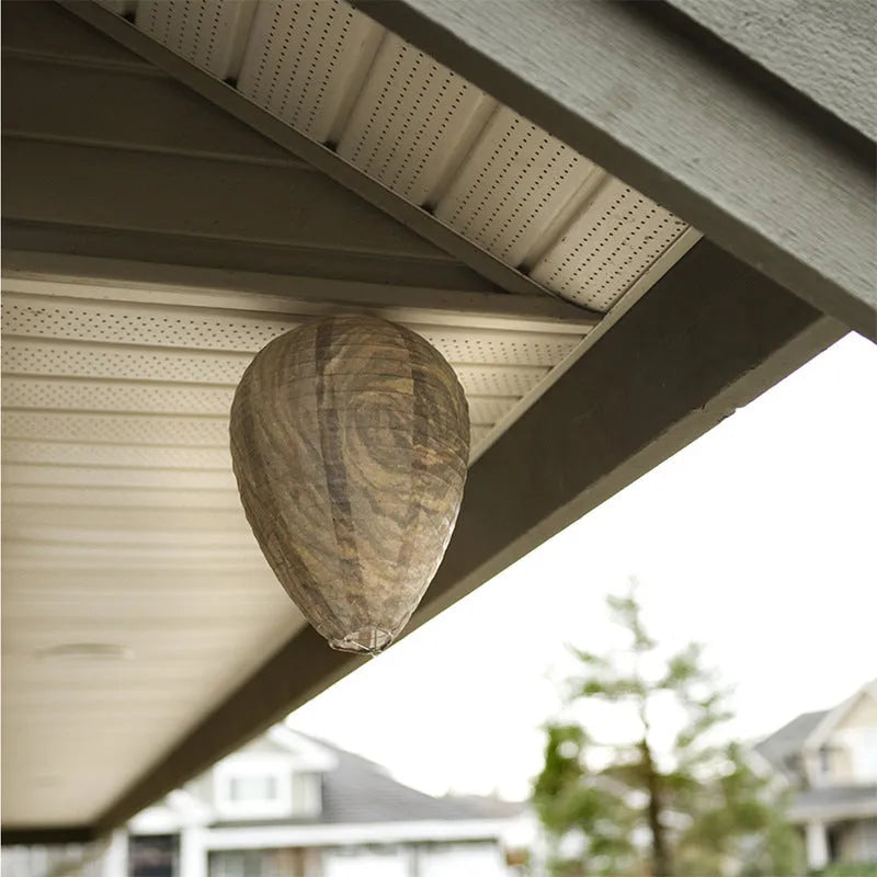 White beehive-shaped paper lantern with hexagonal pattern, measuring 22cm by 28cm.