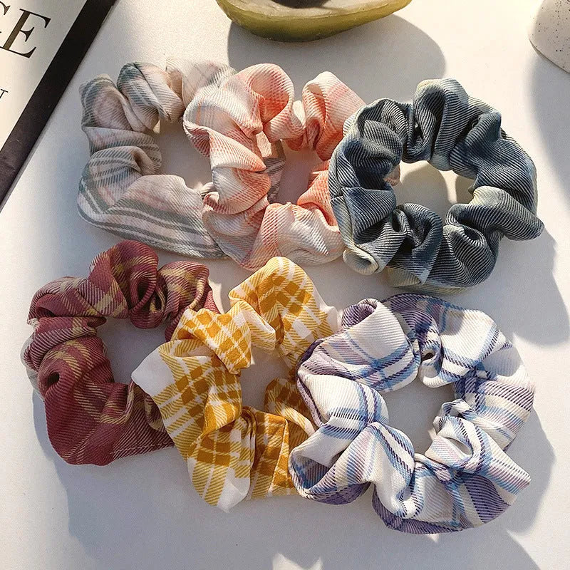 Children's hairpin set showing small intestine hair ring and large intestine head rope designs in autumn colours.