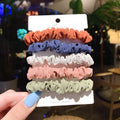 Children's hairpin set showing small intestine hair ring and large intestine head rope designs in autumn colours.