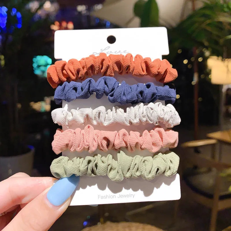 Children's hairpin set showing small intestine hair ring and large intestine head rope designs in autumn colours.