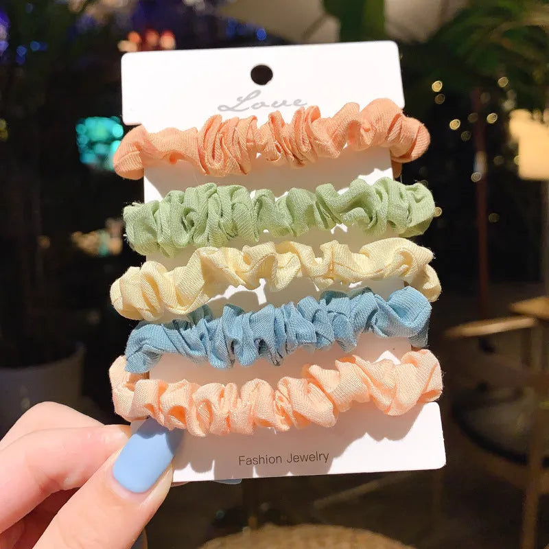 Children's hairpin set showing small intestine hair ring and large intestine head rope designs in autumn colours.