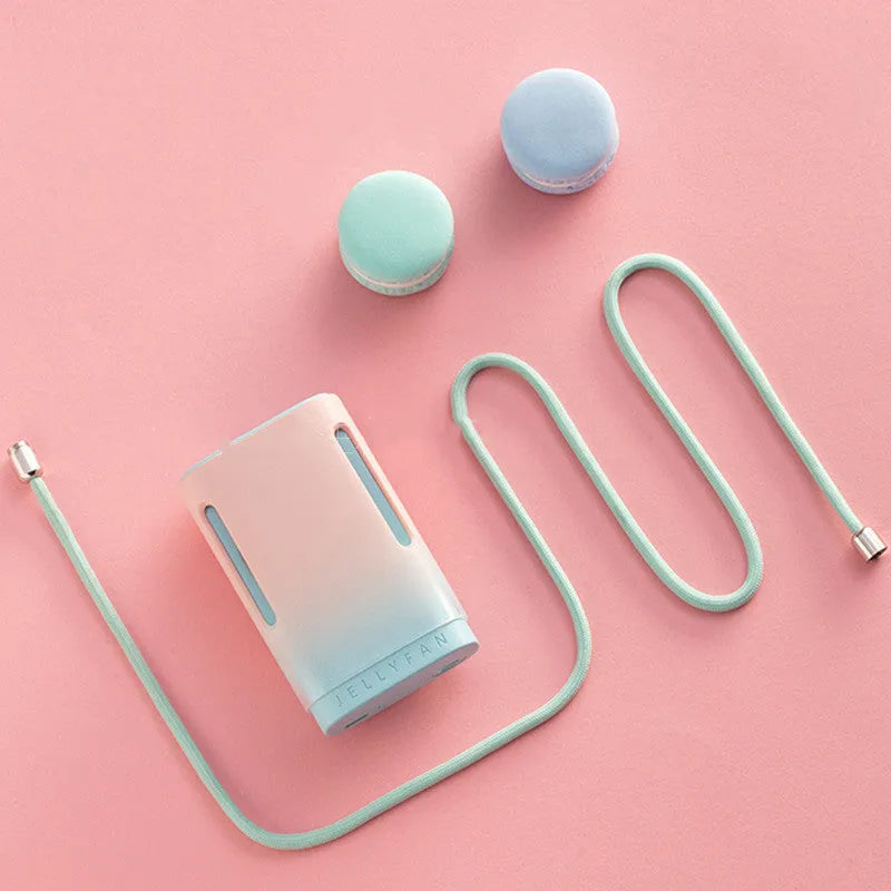 Jelly hanging neck and handheld USB rechargeable mini fan in mint peach colour